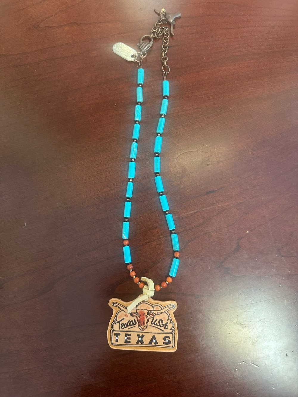 XOXO Turquoise and Brown Texas Pendant Necklace